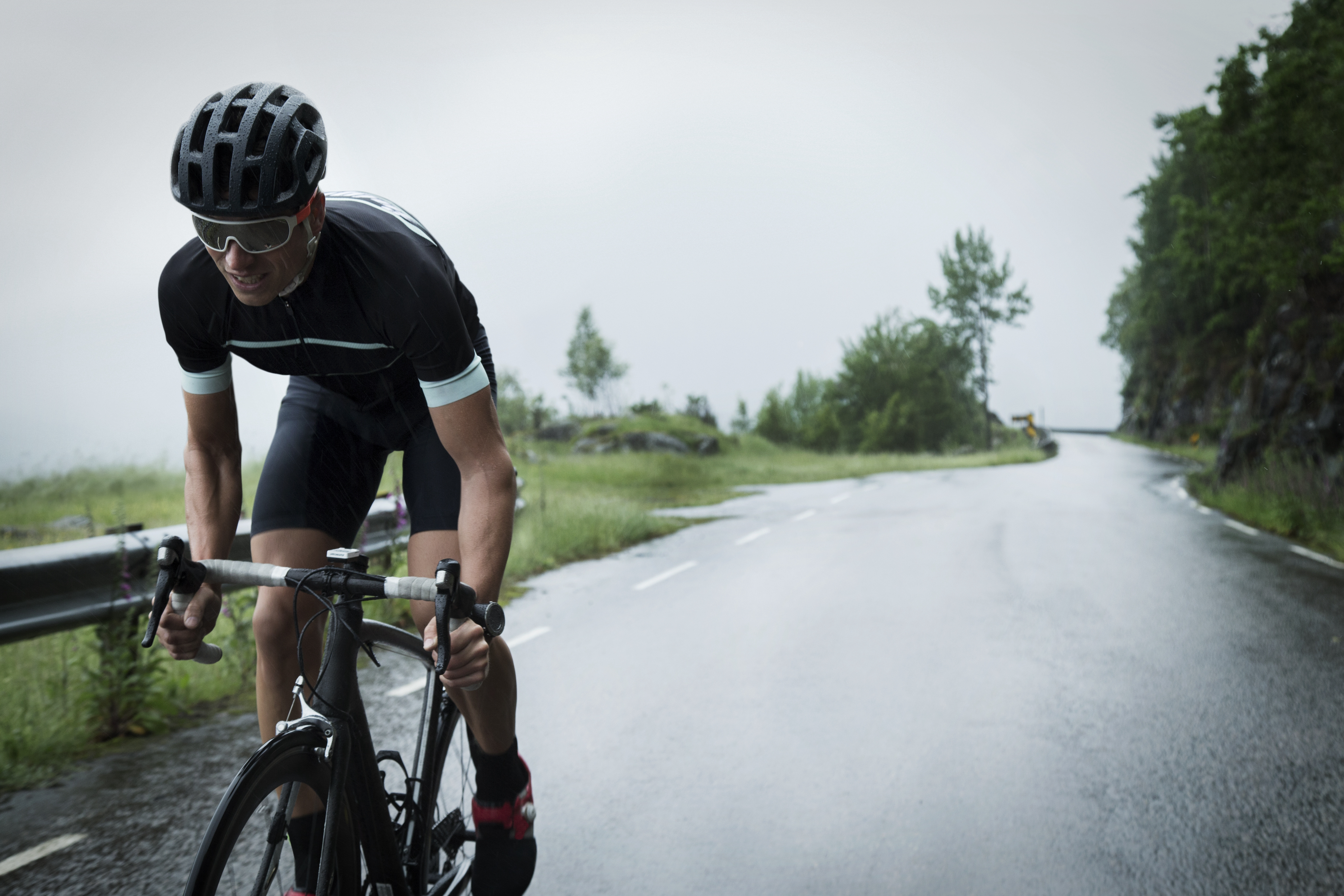 male road cyclist mountain road
